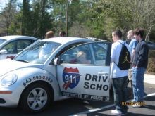 Students checking out the Beetle.